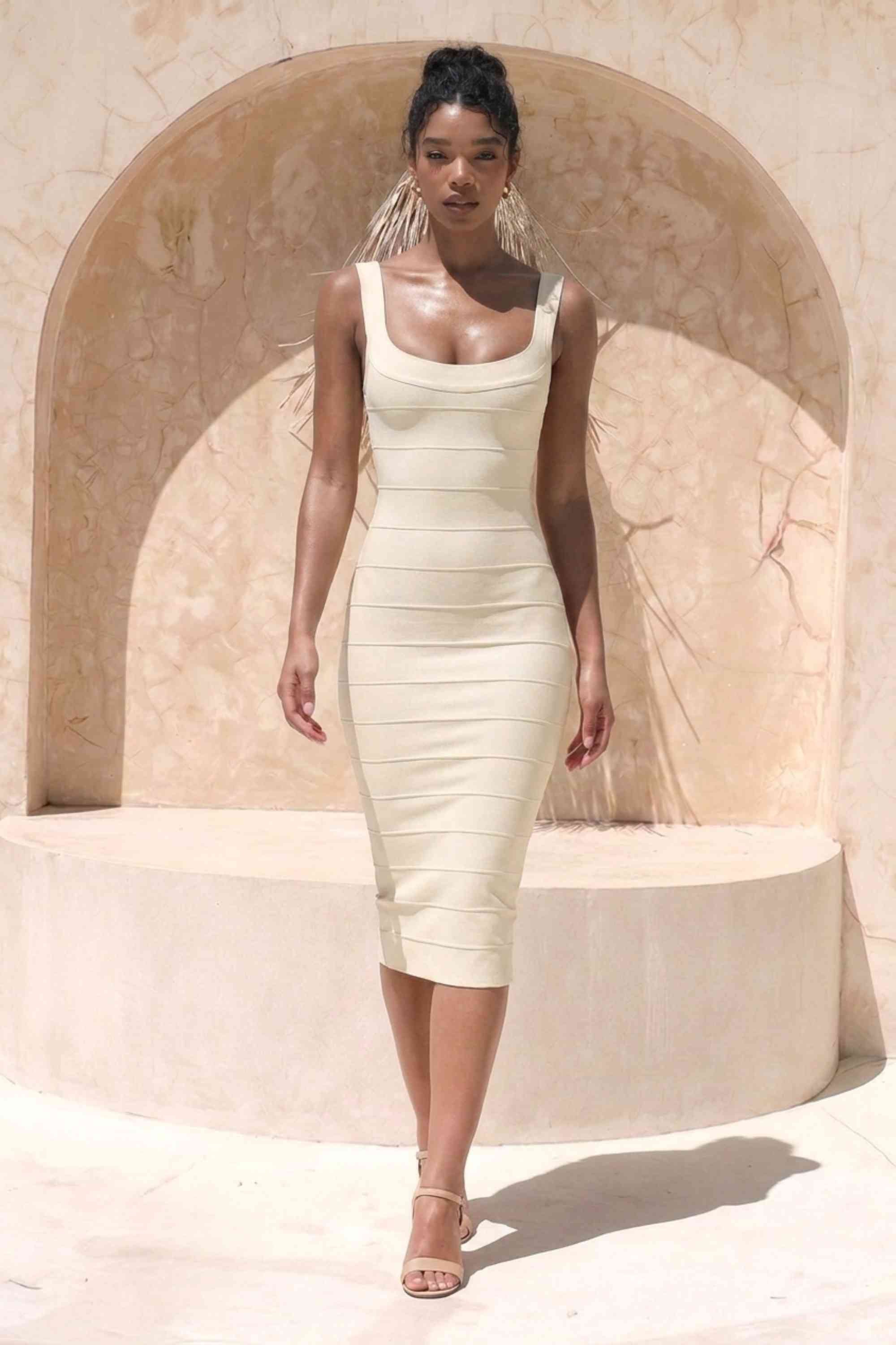 Woman wearing a figure flattering Cindy Bandage Midi Dress - Cream BODYCON COLLECTION Pty Ltd