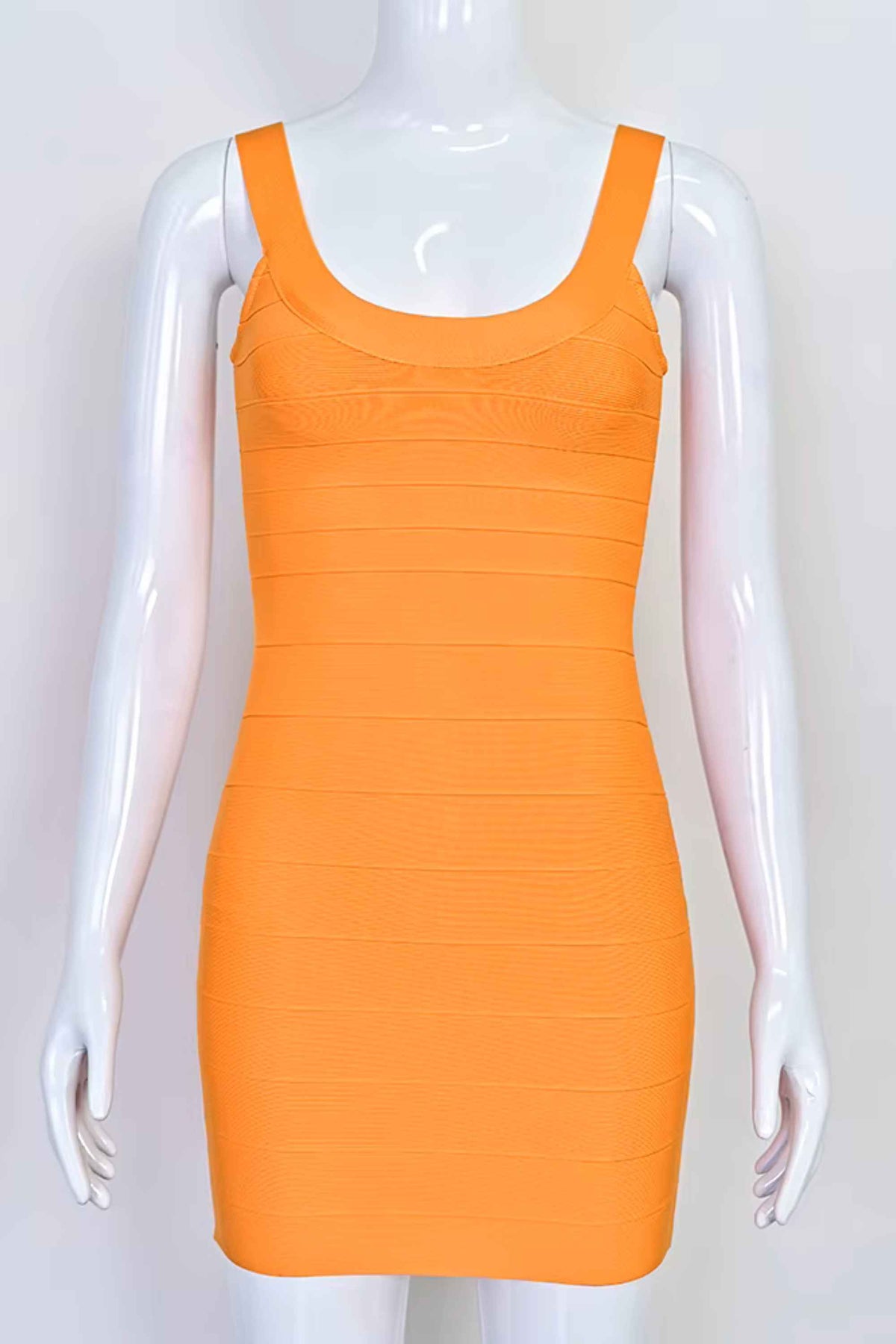 Woman wearing a figure flattering Cindy Bandage Mini Dress - Apricot Orange BODYCON COLLECTION Pty Ltd