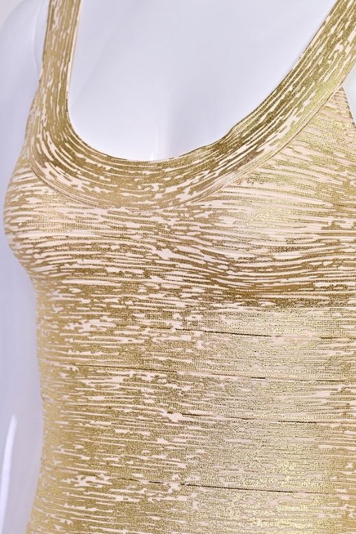 Woman wearing a figure flattering Cindy Bandage Mini Dress - Gold BODYCON COLLECTION Pty Ltd
