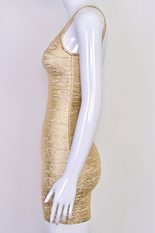 Woman wearing a figure flattering Cindy Bandage Mini Dress - Gold BODYCON COLLECTION Pty Ltd