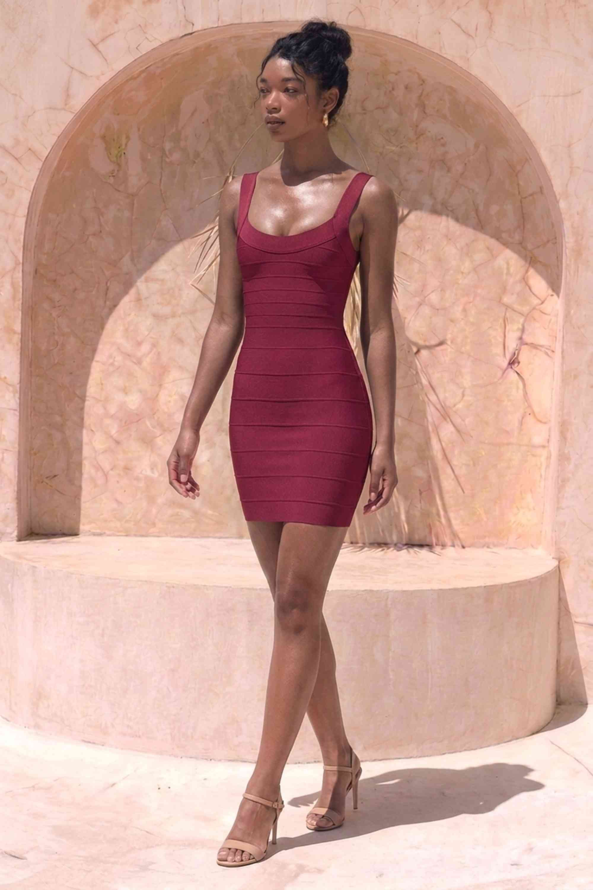 Woman wearing a figure flattering Cindy Bandage Mini Dress - Red Wine BODYCON COLLECTION Pty Ltd
