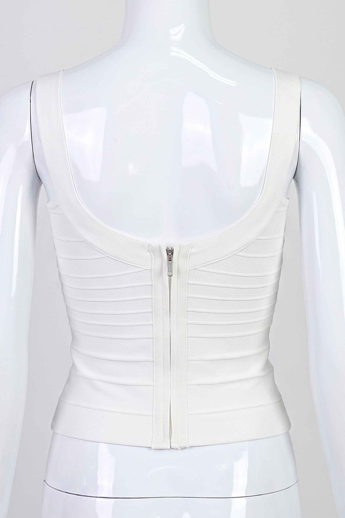 Woman wearing a figure flattering Cindy Bandage Top - Pearl White BODYCON COLLECTION Pty Ltd