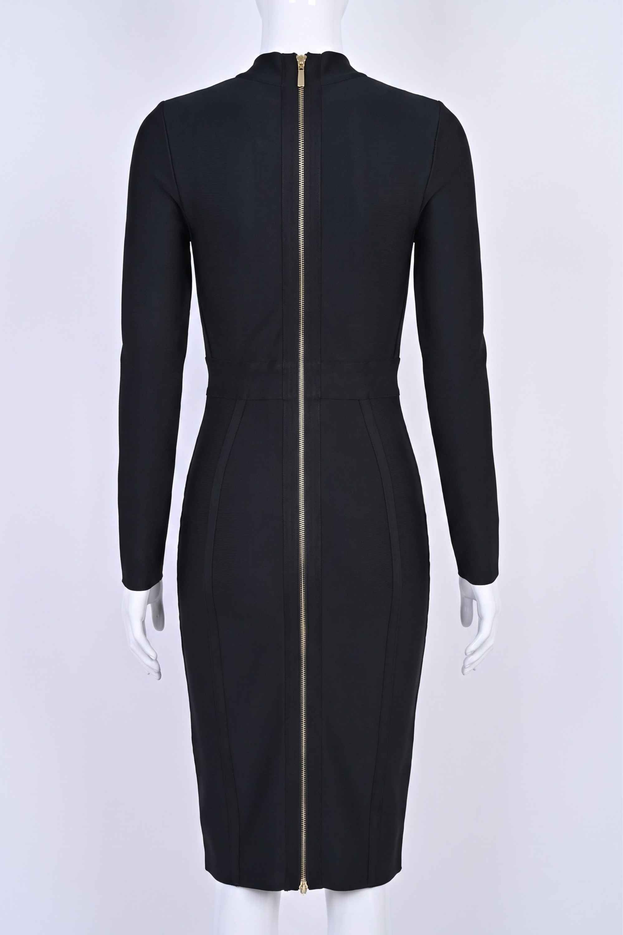 Woman wearing a figure flattering Dee Long Sleeve Bandage Dress - Classic Black BODYCON COLLECTION