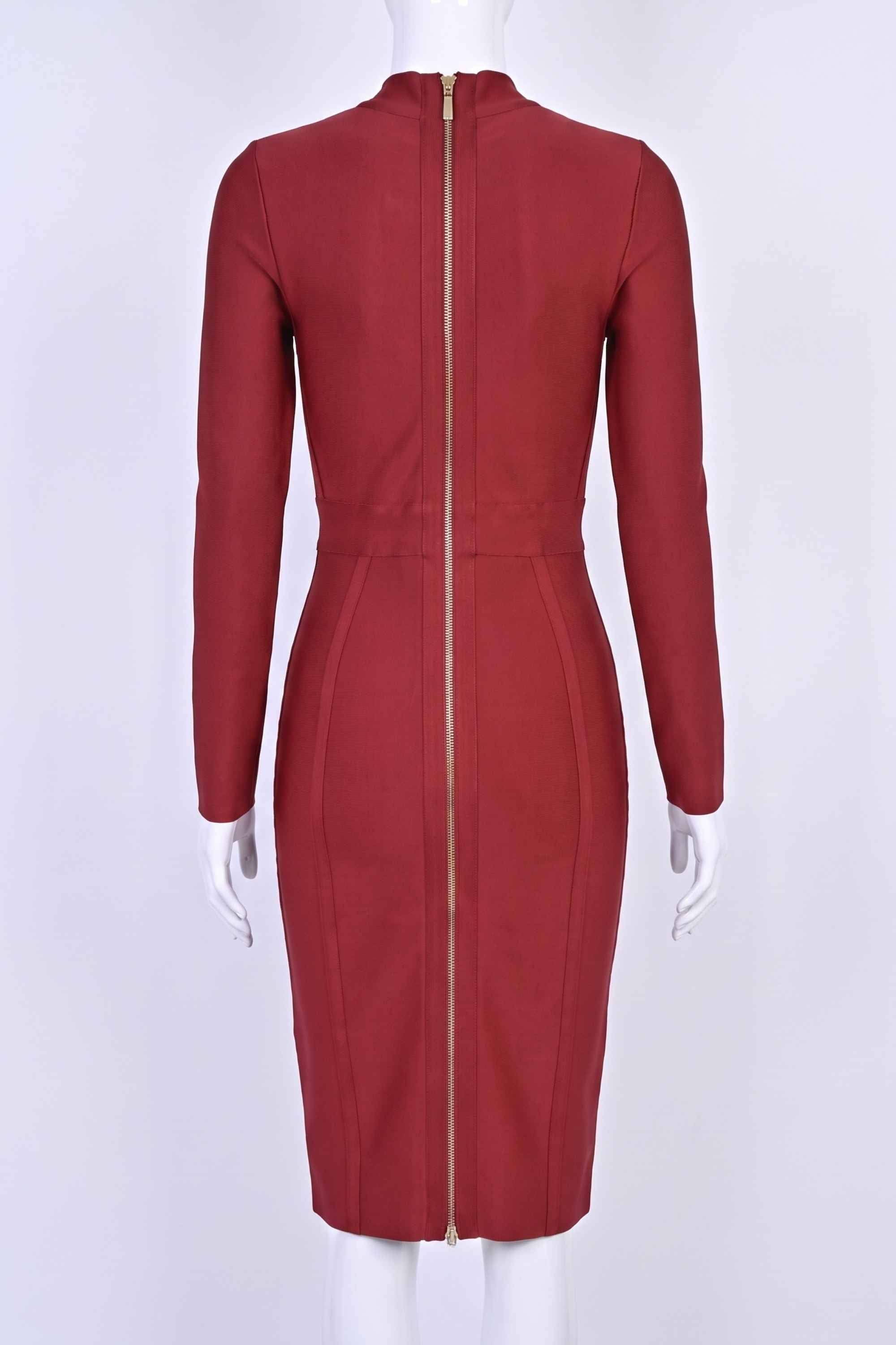 Woman wearing a figure flattering Dee Long Sleeve Bandage Dress - Red Wine BODYCON COLLECTION