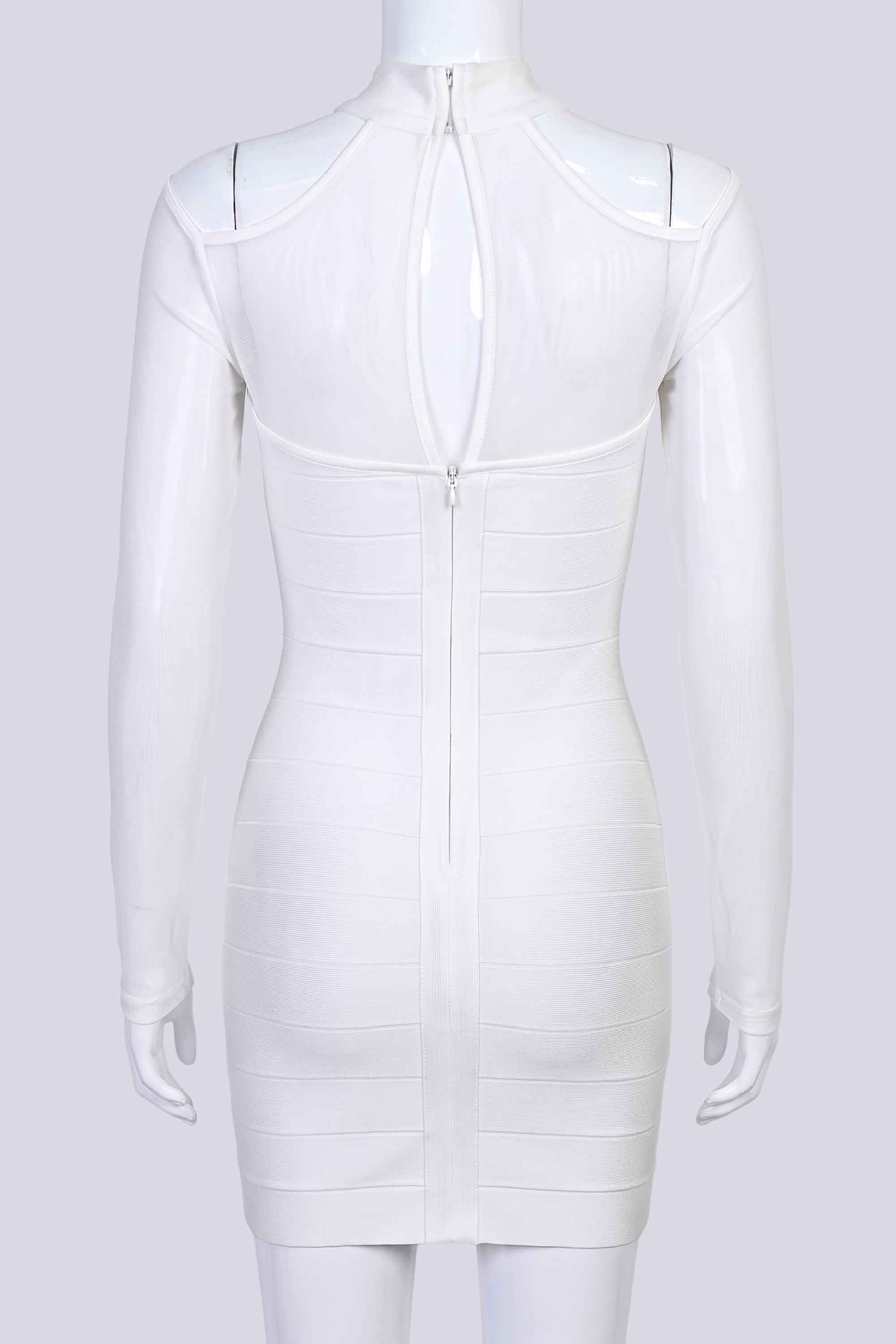 Woman wearing a figure flattering Dovie Long Sleeve Bandage Mini Dress - White Pearl BODYCON COLLECTION Pty Ltd