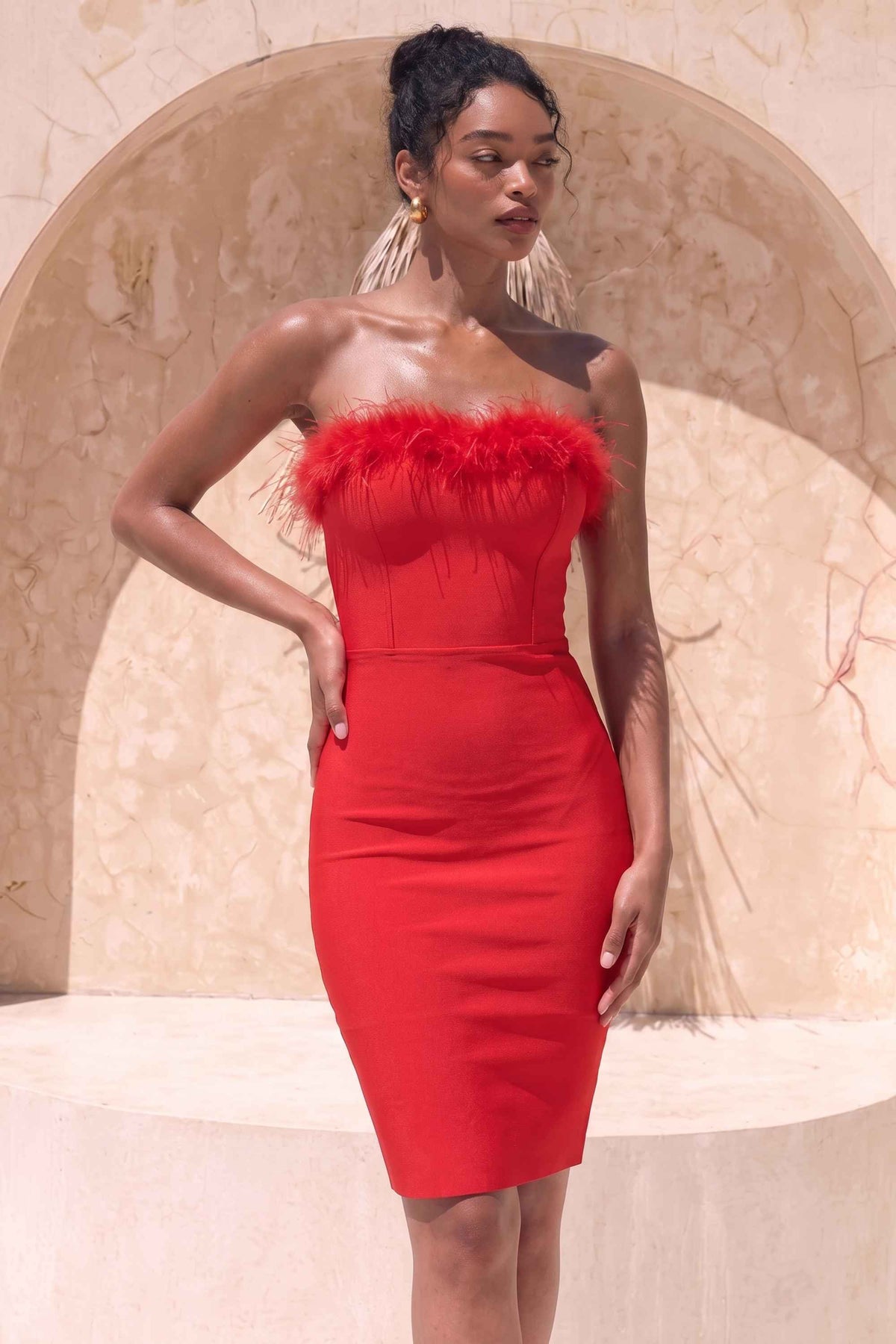 Woman wearing a figure flattering Erin Bandage Dress - Lipstick Red BODYCON COLLECTION
