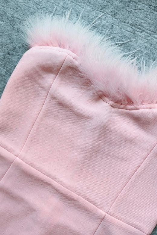 Woman wearing a figure flattering Erin Bandage Maxi Dress - Dusty Pink BODYCON COLLECTION