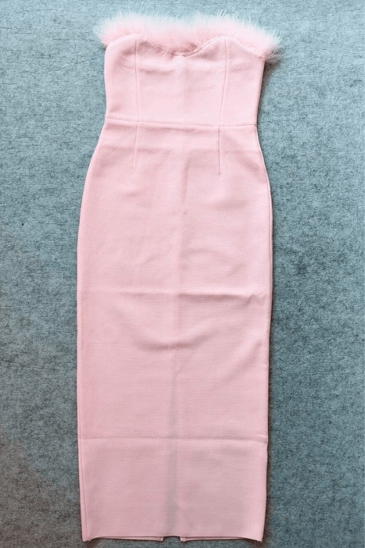 Woman wearing a figure flattering Erin Bodycon Maxi Dress - Dusty Pink BODYCON COLLECTION