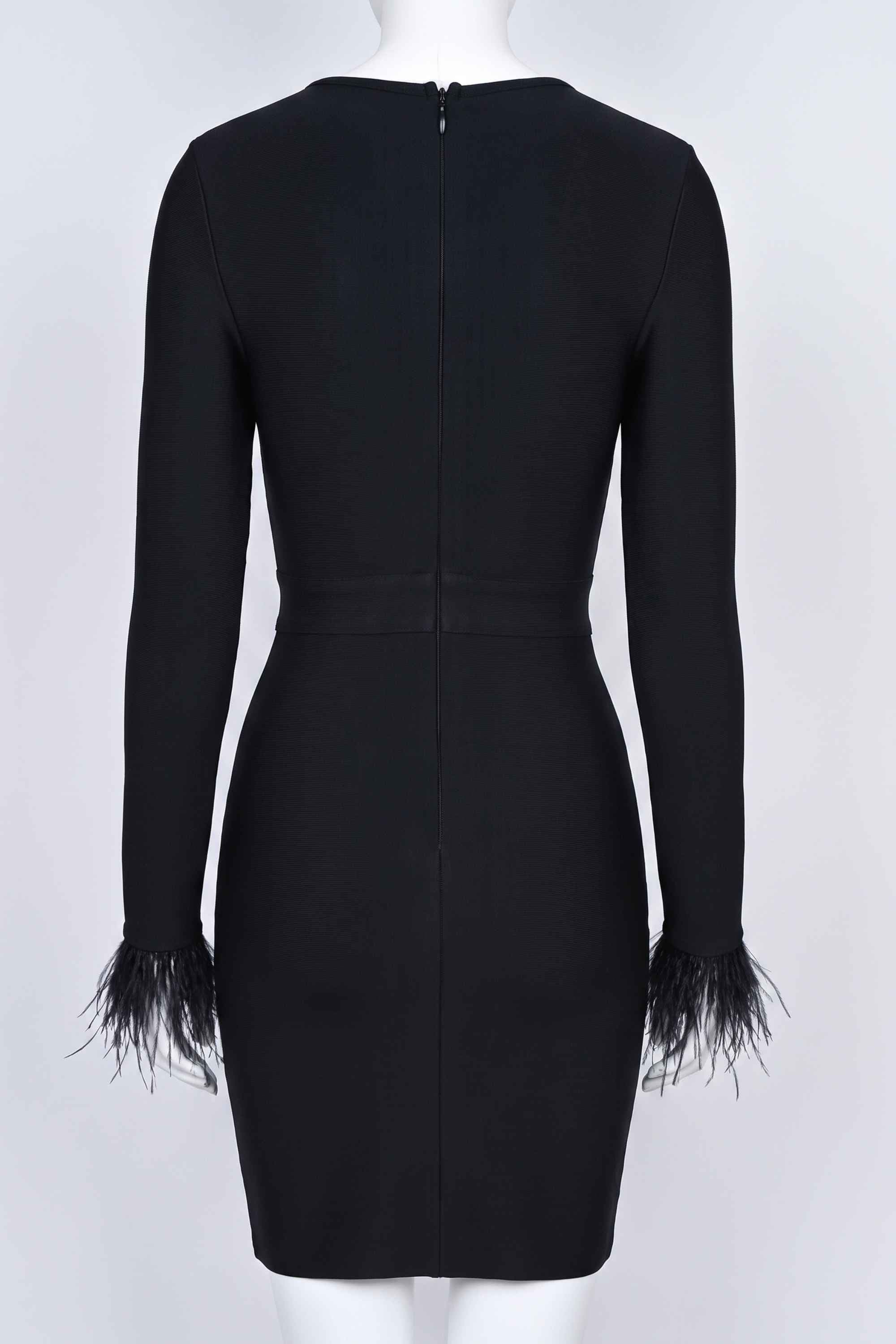 Woman wearing a figure flattering Erin Long Sleeve Bandage Mini Dress - Classic Black BODYCON COLLECTION