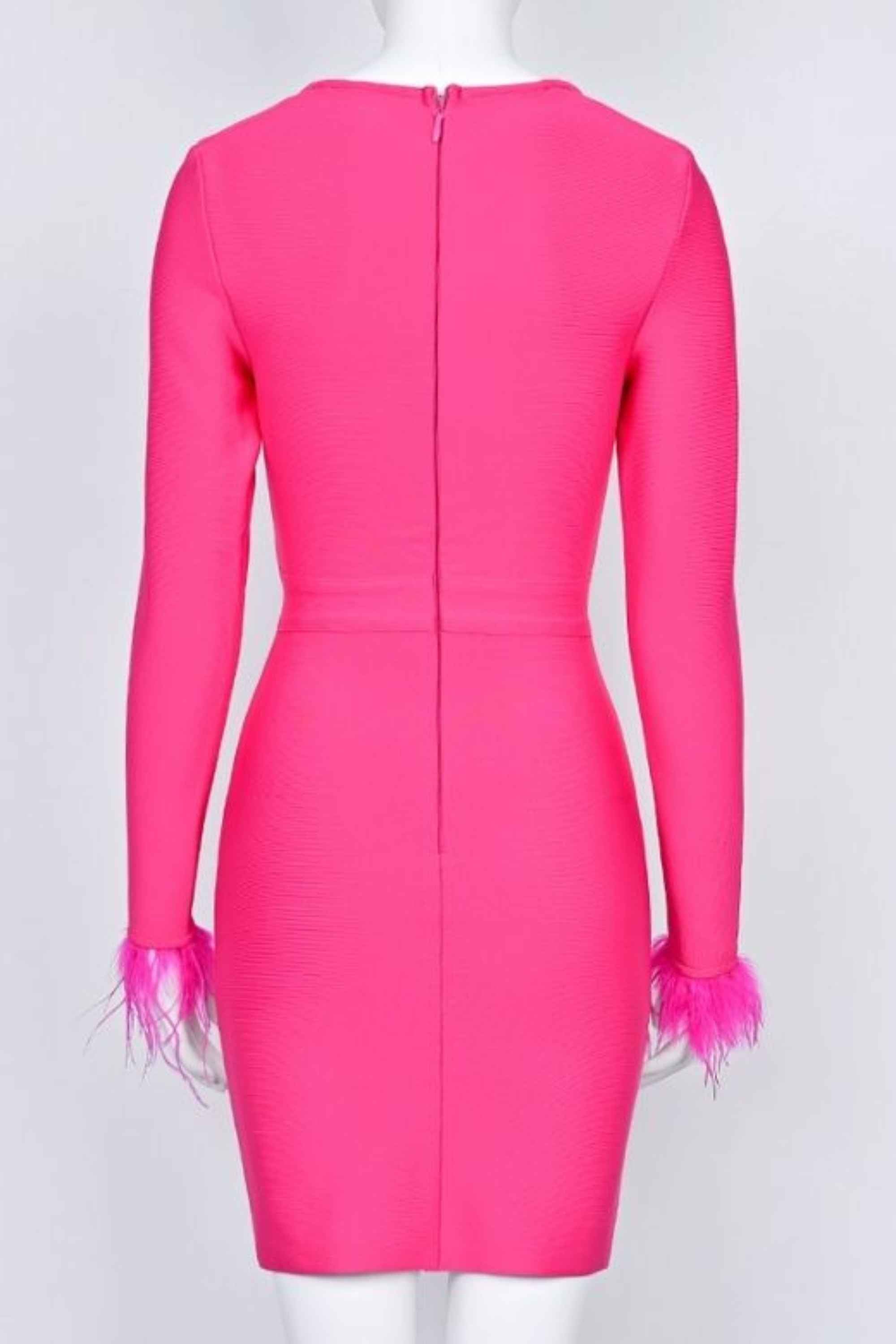 Woman wearing a figure flattering Erin Long Sleeve Bandage Mini Dress - Hot Pink BODYCON COLLECTION
