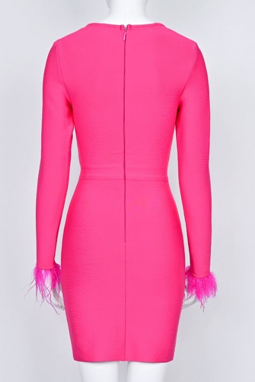 Woman wearing a figure flattering Erin Long Sleeve Bandage Mini Dress - Hot Pink BODYCON COLLECTION