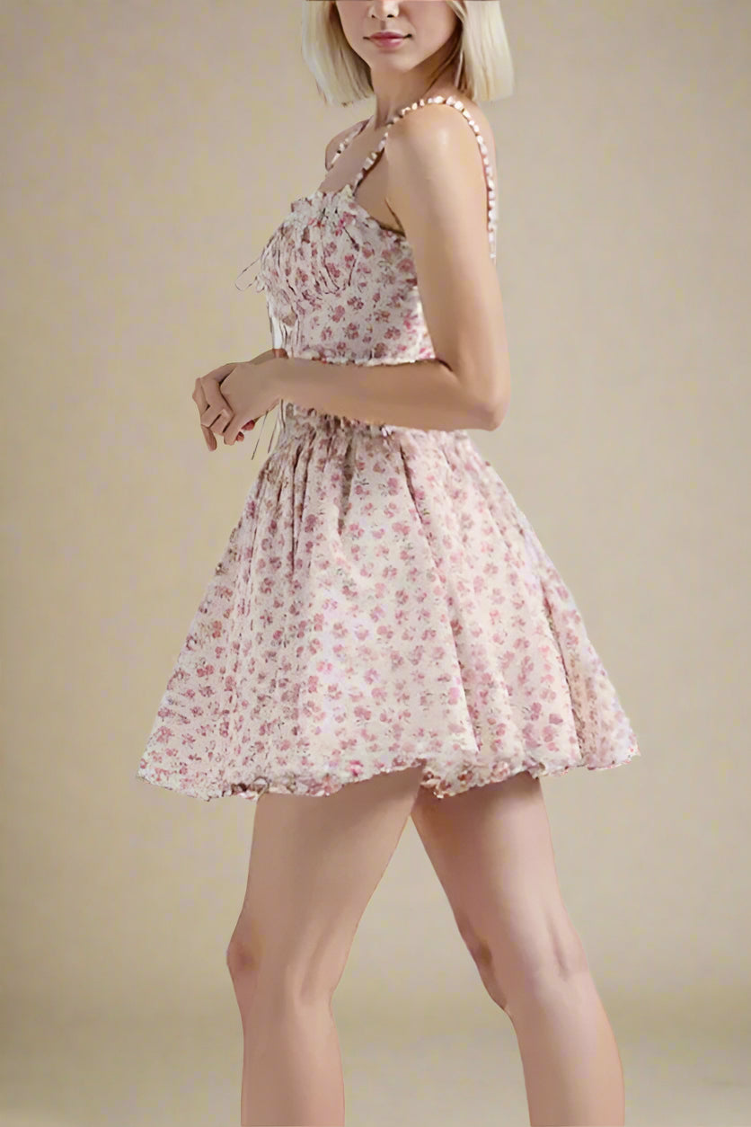 Woman wearing a figure flattering Estelle Bodycon Mini Dress - Blush Pink BODYCON COLLECTION Pty Ltd