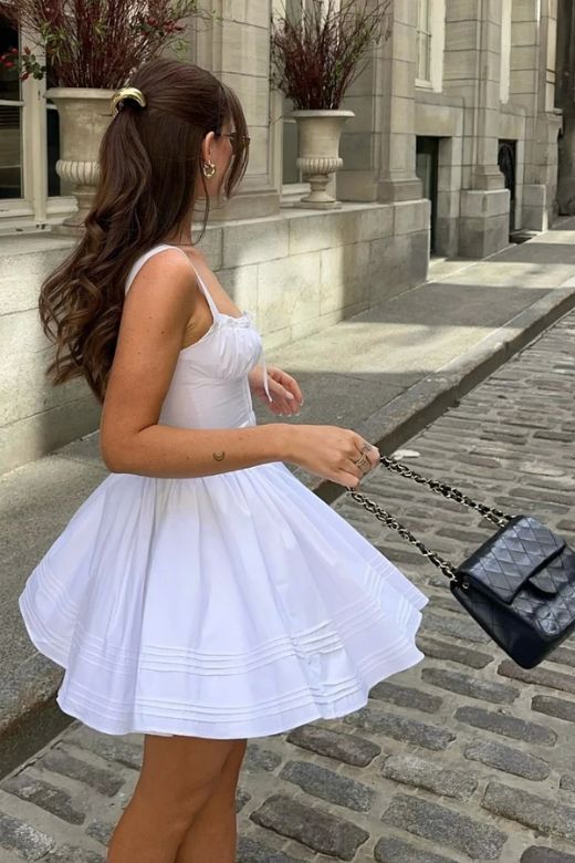 Woman wearing a figure flattering Estelle Bodycon Mini Dress - Dusty Pink BODYCON COLLECTION Pty Ltd
