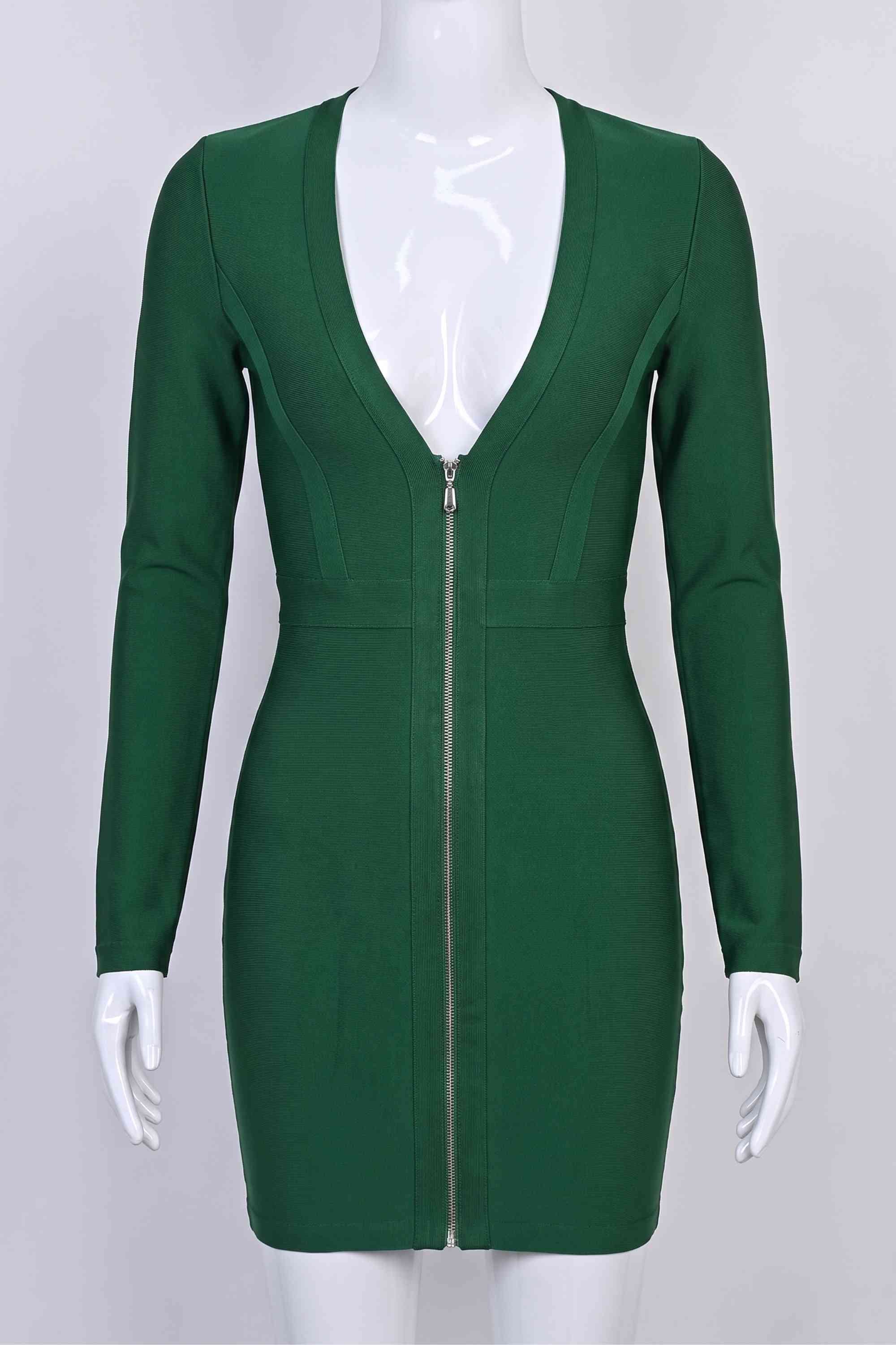 Woman wearing a figure flattering Eva Long Sleeve Bandage Mini Dress - Emerald Green BODYCON COLLECTION