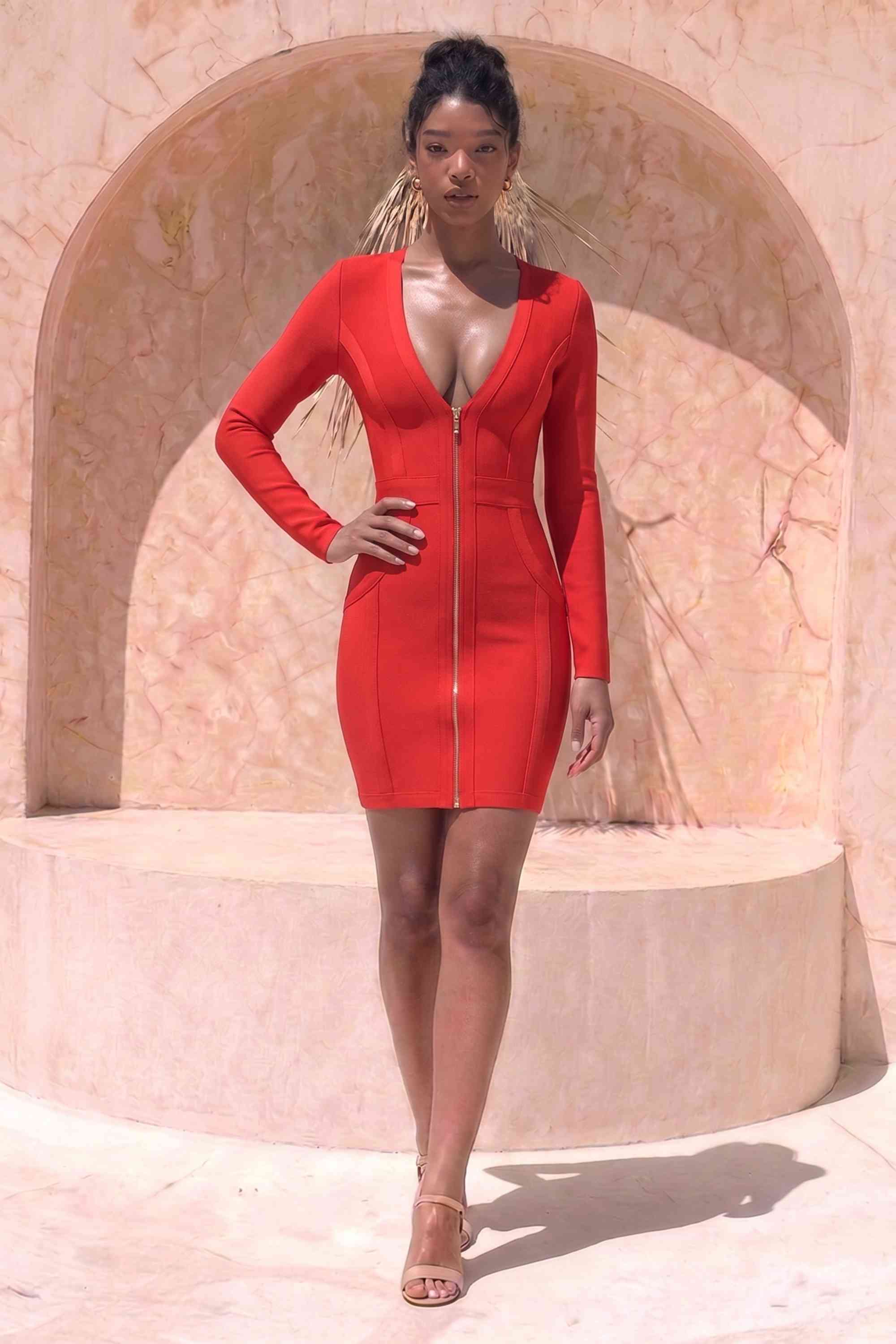Woman wearing a figure flattering Eva Long Sleeve Bandage Mini Dress - Lipstick Red BODYCON COLLECTION