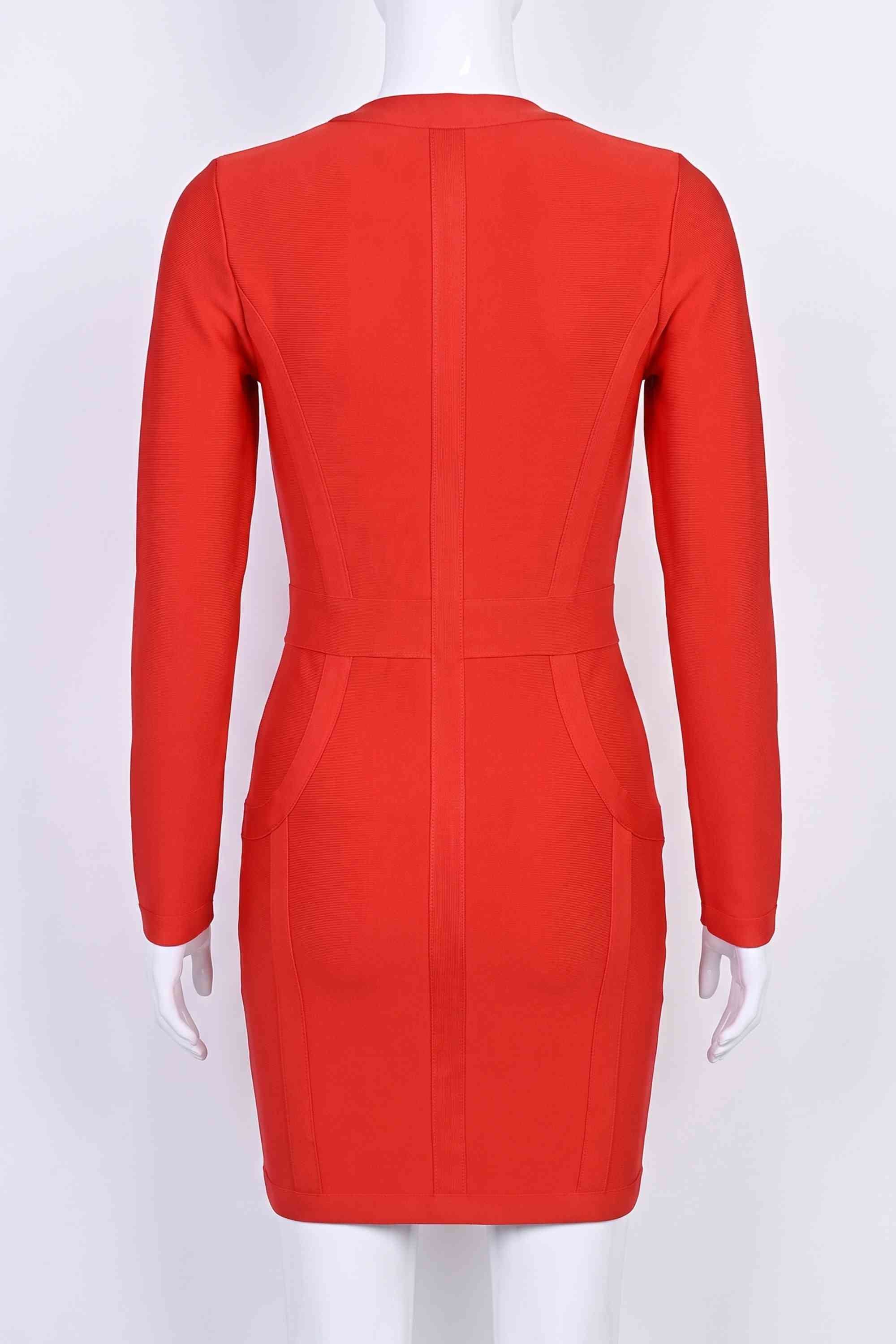 Woman wearing a figure flattering Eva Long Sleeve Bandage Mini Dress - Lipstick Red BODYCON COLLECTION