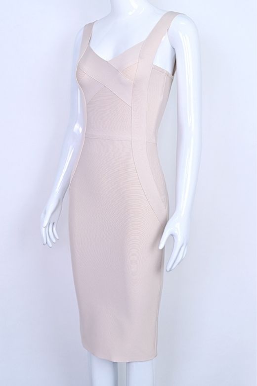 Woman wearing a figure flattering Freya Bandage Dress - Beige BODYCON COLLECTION