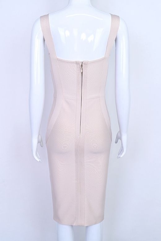 Woman wearing a figure flattering Freya Bandage Dress - Beige BODYCON COLLECTION