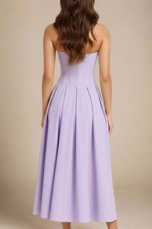 Woman wearing a figure flattering Gabbi Bodycon Midi Dress - Lavender Purple BODYCON COLLECTION
