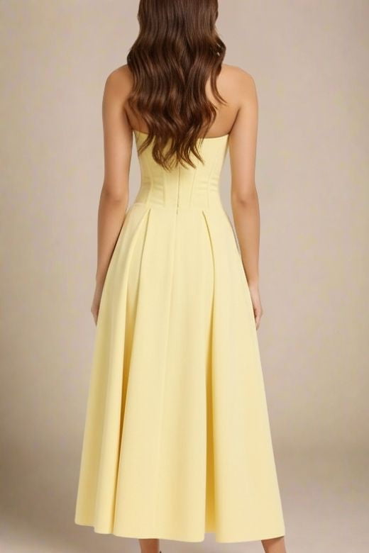Woman wearing a figure flattering Gabbi Bodycon Midi Dress - Sun Yellow BODYCON COLLECTION