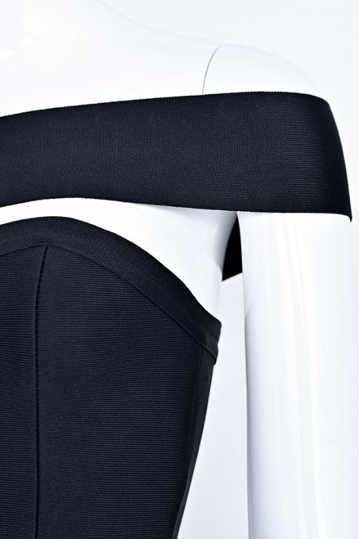 Woman wearing a figure flattering Gianna Bandage Dress - Classic Black BODYCON COLLECTION