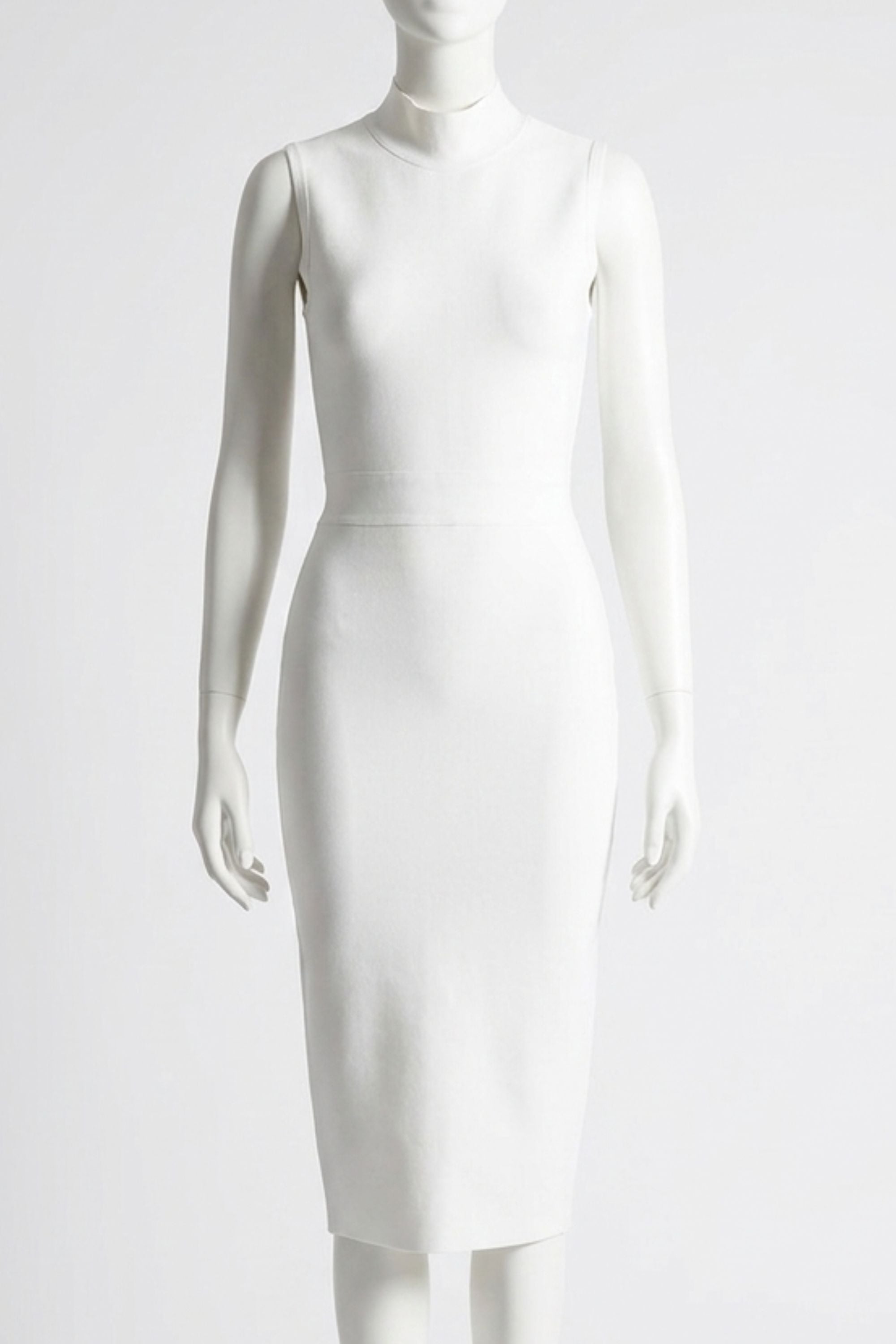 Woman wearing a figure flattering Grace Bandage Midi Dress - Pearl White Bodycon Collection
