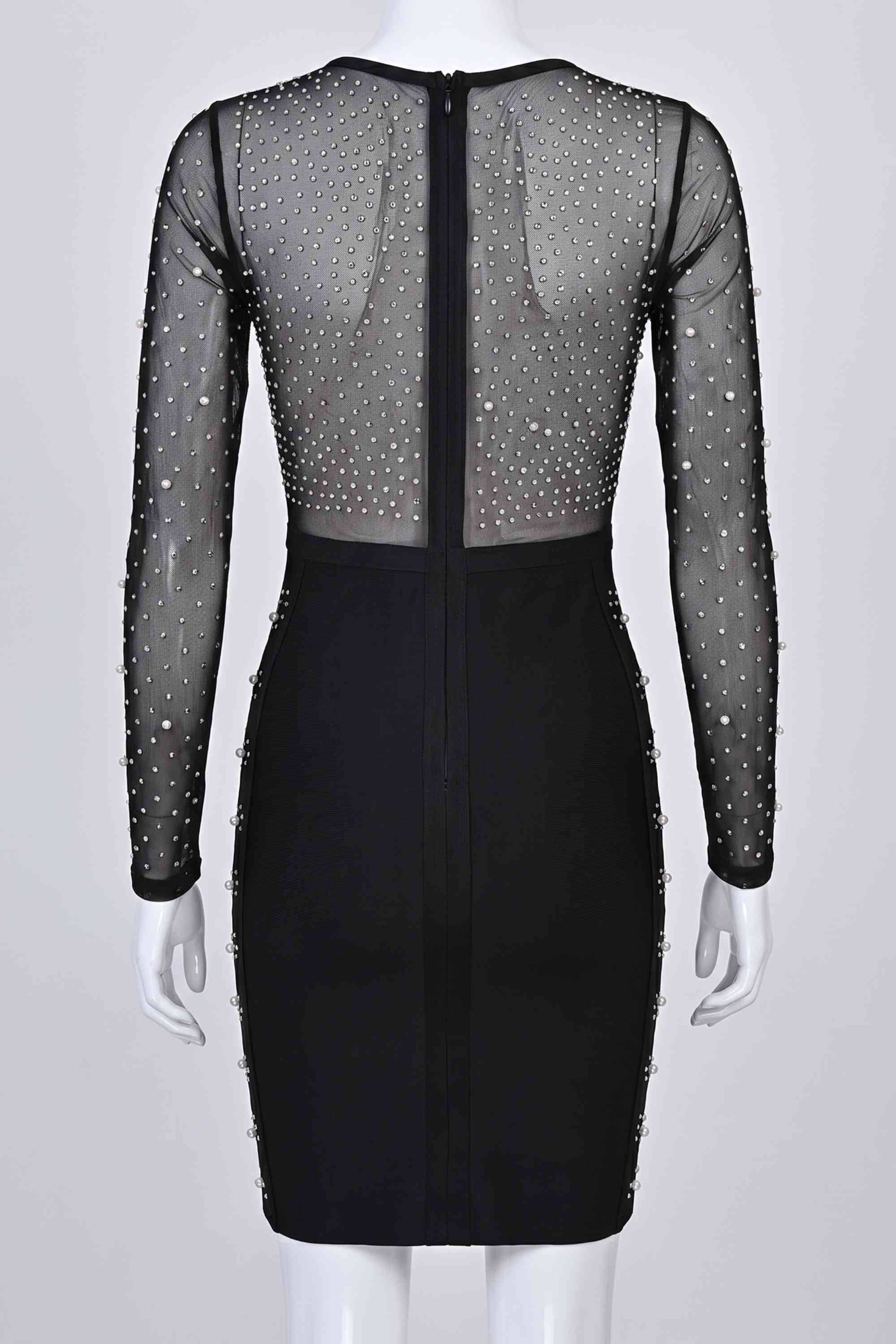 Woman wearing a figure flattering Halle Long Sleeve Bodycon Mini Dress - Classic Black BODYCON COLLECTION Pty Ltd
