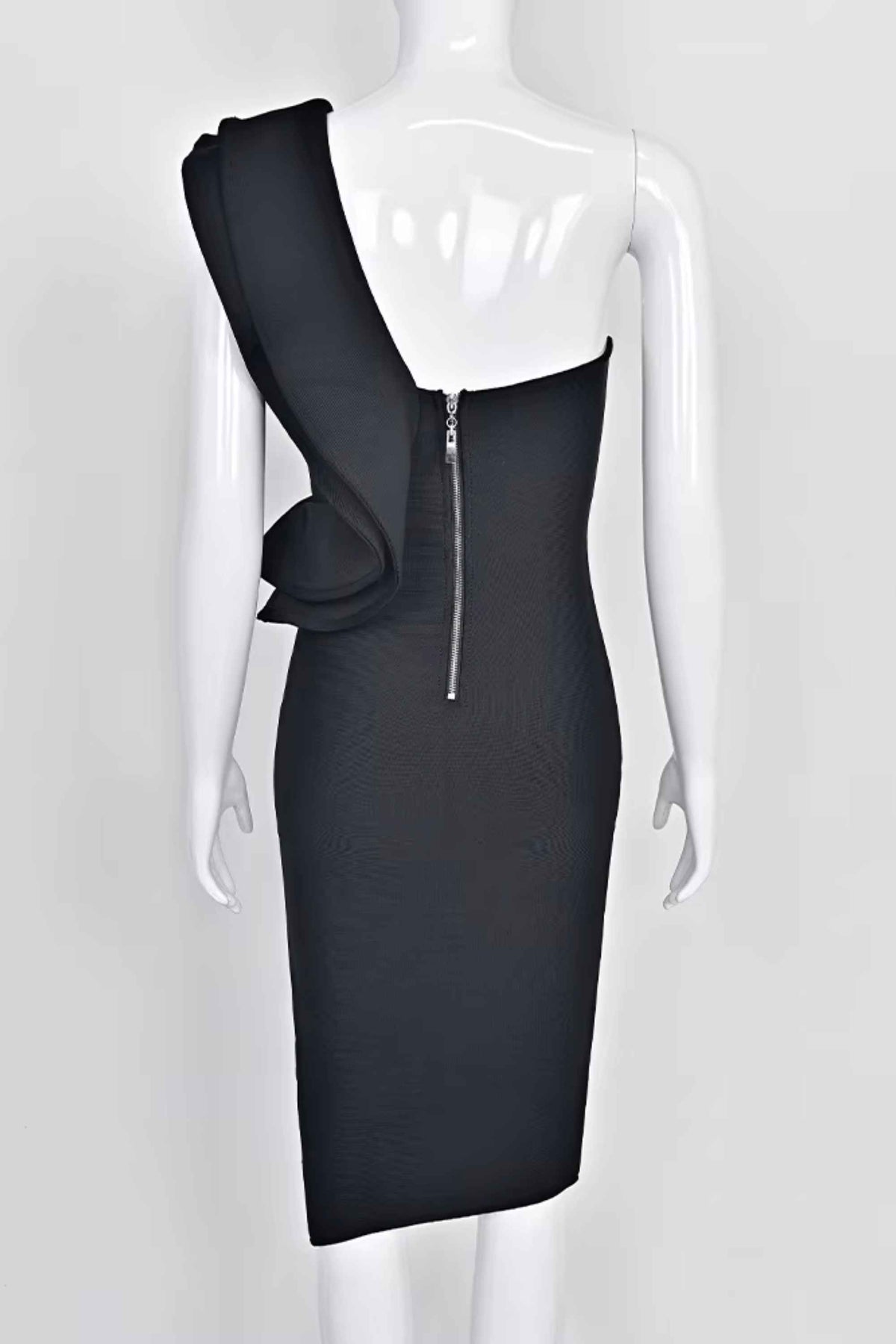 Woman wearing a figure flattering Hayley Bodycon Dress - Classic Black Bodycon Collection