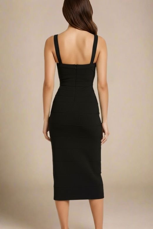 Woman wearing a figure flattering black party dress Heidi Bandage Midi Dress - Classic Black Bodycon Collection