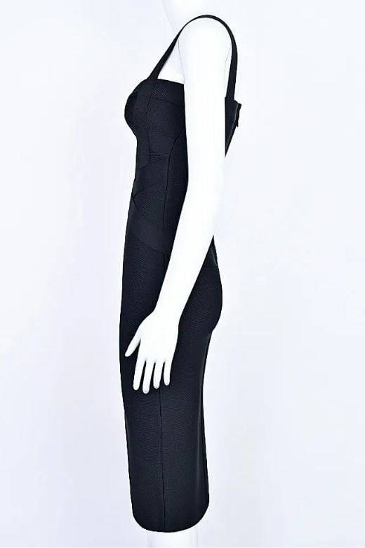 Woman wearing a figure flattering Heidi Bandage Midi Dress - Classic Black Bodycon Collection