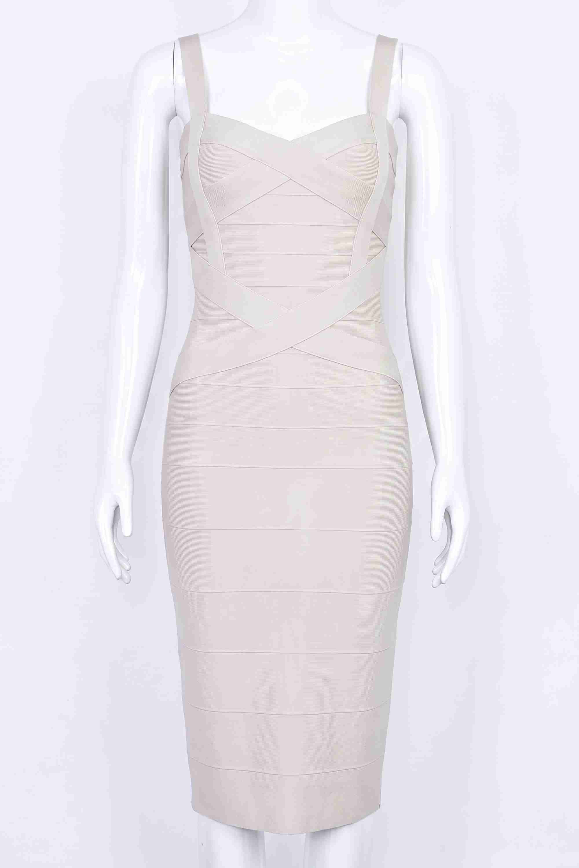 Woman wearing a figure flattering Heidi Bandage Midi Dress - Cream Bodycon Collection