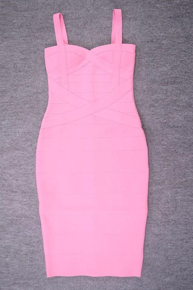 Woman wearing a figure flattering Heidi Bandage Midi Dress - Dusty Pink Bodycon Collection