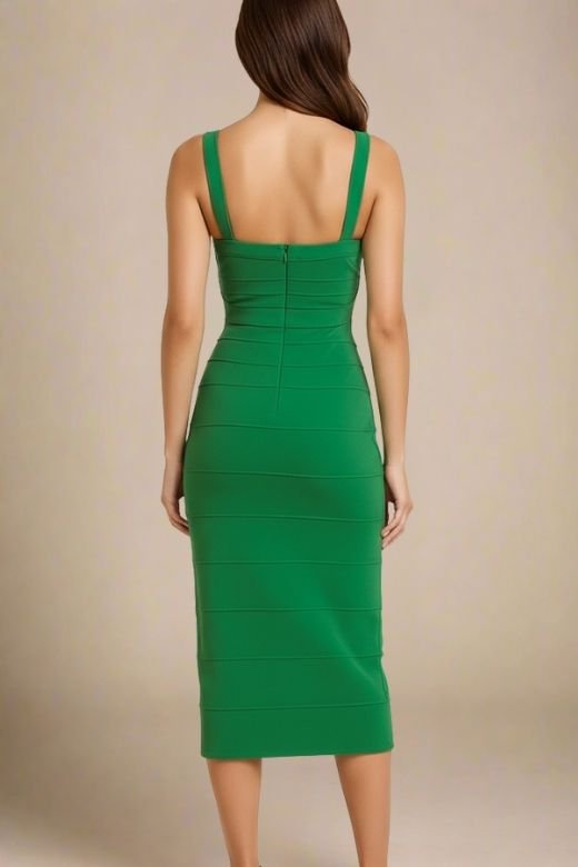 Woman wearing a figure flattering  Heidi Bandage Midi Dress - Emerald Green Bodycon Collection