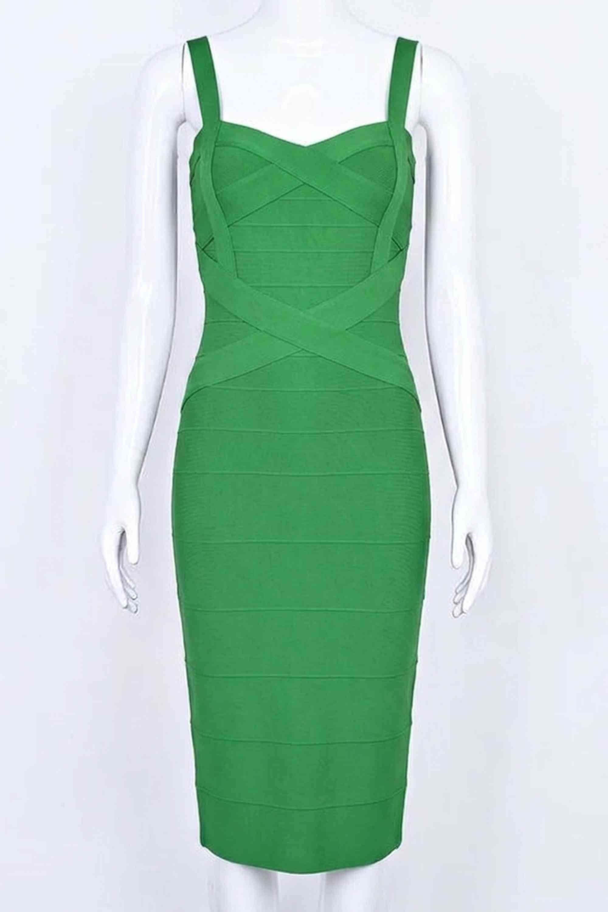 Woman wearing a figure flattering Heidi Bandage Midi Dress - Emerald Green Bodycon Collection
