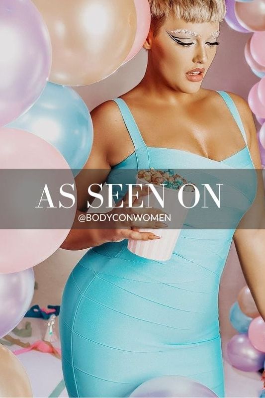 Woman wearing a figure flattering Heidi Bandage Midi Dress - Sky Blue Bodycon Collection