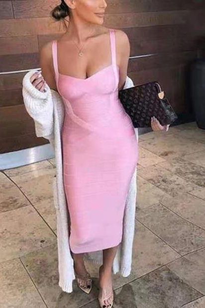 Woman wearing a figure flattering Heidi Bandage Midi Dress - Sun Yellow Bodycon Collection
