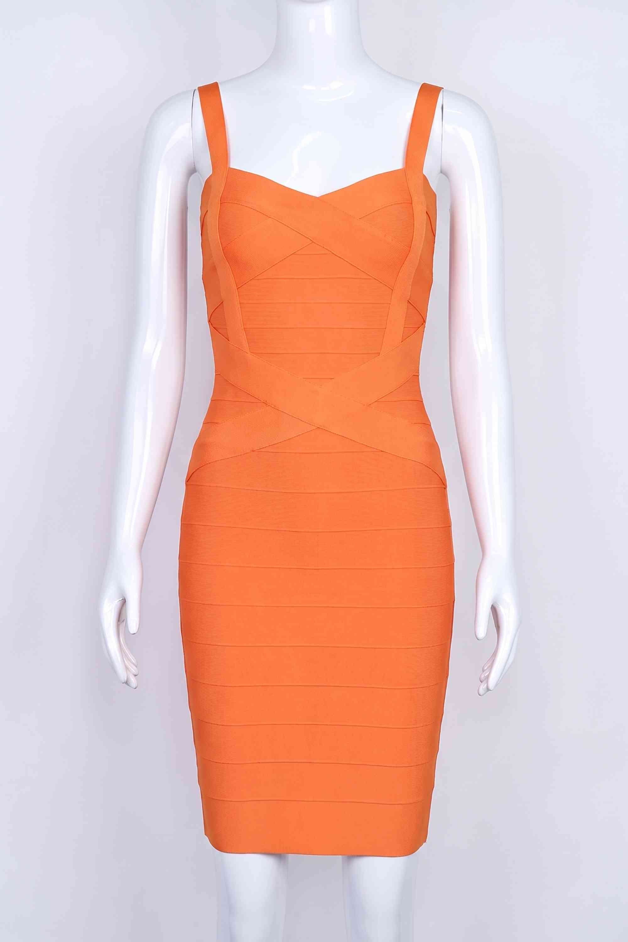 Woman wearing a figure flattering Heidi Bandage Mini Dress - Apricot Orange Bodycon Collection