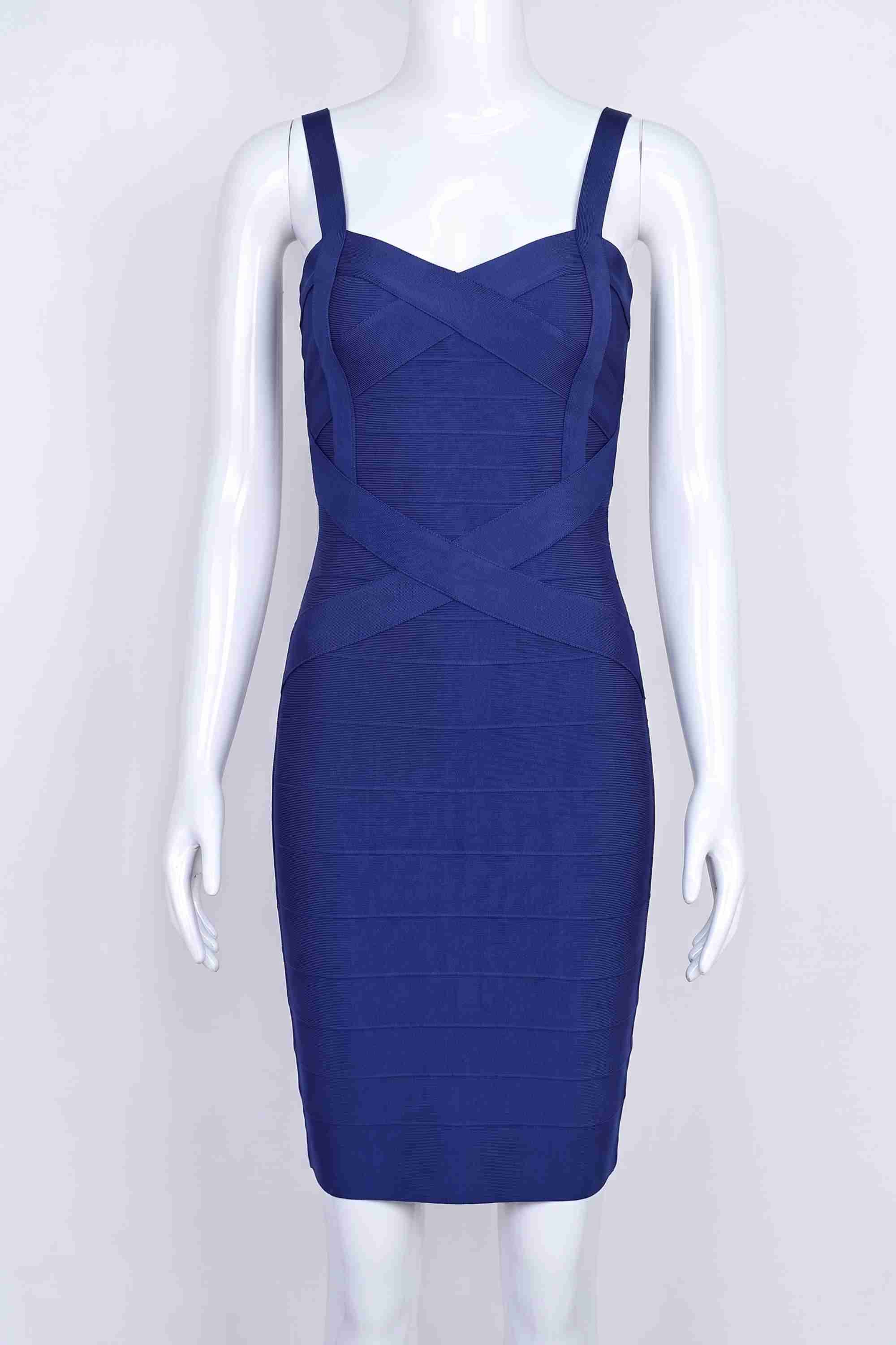 Woman wearing a figure flattering Heidi Bandage Mini Dress - Navy Blue Bodycon Collection