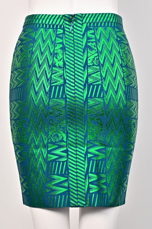 Woman wearing a figure flattering High Waist Metallic Mini Skirt - Emerald Green BODYCON COLLECTION