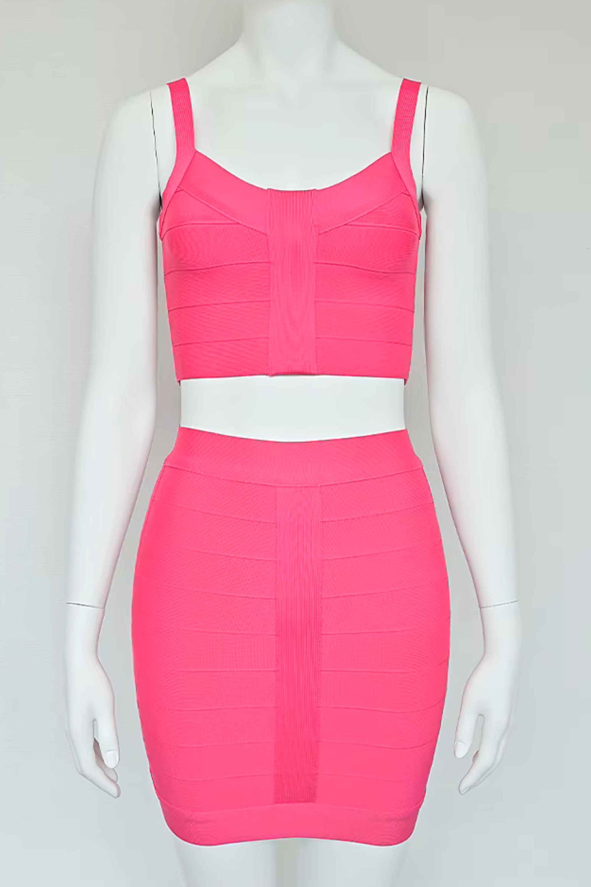 Woman wearing a figure flattering India Bandage Top and Mini Skirt Set - Hot Pink BODYCON COLLECTION
