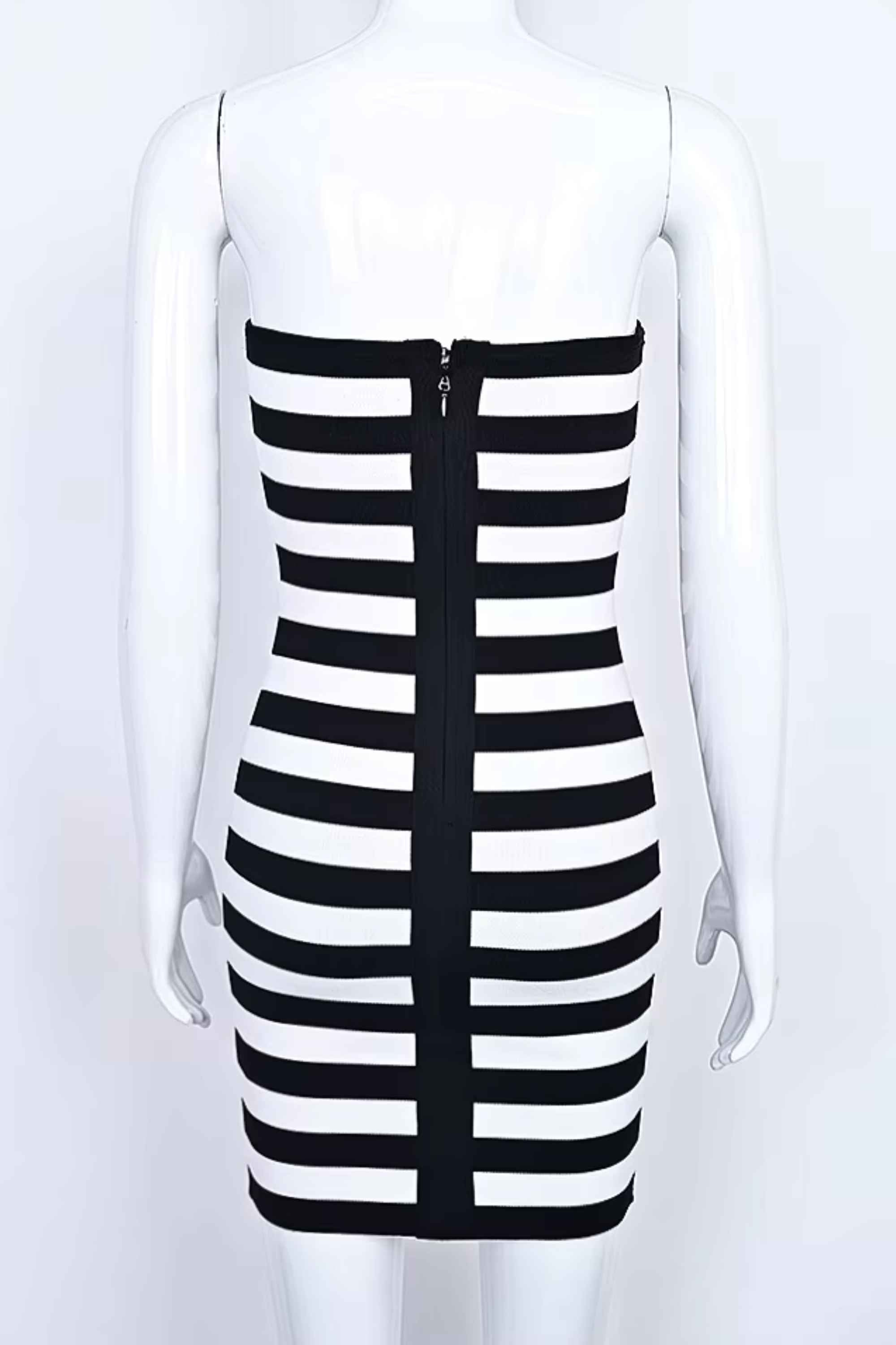 Woman wearing a figure flattering Ingrid Bandage Mini Dress - Classic Black BODYCON COLLECTION
