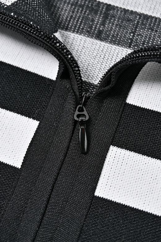 Woman wearing a figure flattering Ingrid Bandage Mini Dress - Classic Black BODYCON COLLECTION