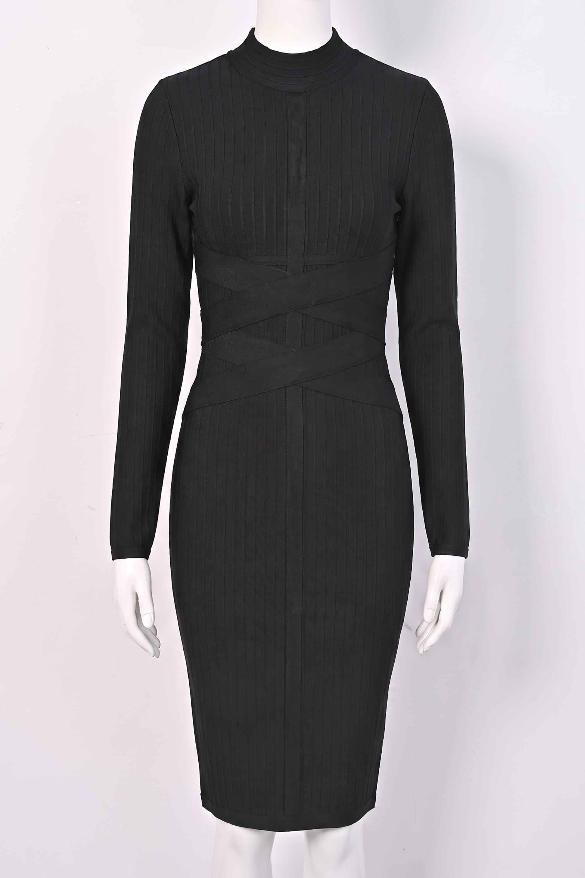 Woman wearing a figure flattering Jane Long Sleeve Bodycon Midi Dress - Classic Black Bodycon Collection
