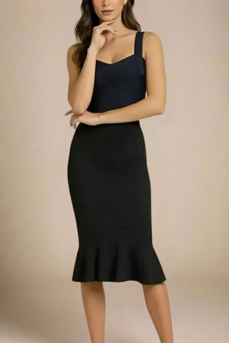 Woman wearing a figure flattering Jay Bandage Crop Top - Classic Black BODYCON COLLECTION