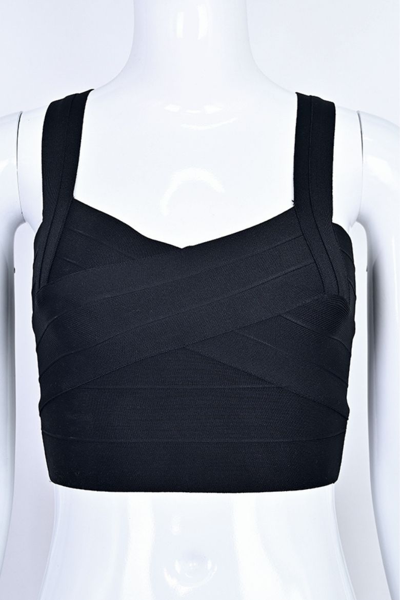 Woman wearing a figure flattering Jay Bandage Crop Top - Classic Black BODYCON COLLECTION