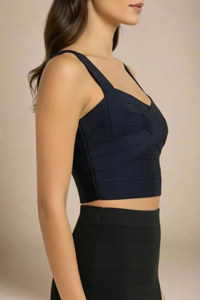Woman wearing a figure flattering Jay Bandage Crop Top - Classic Black BODYCON COLLECTION
