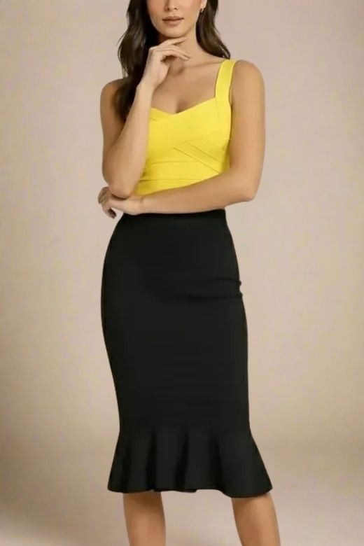 Woman wearing a figure flattering Jay Bandage Crop Top - Sun Yellow BODYCON COLLECTION