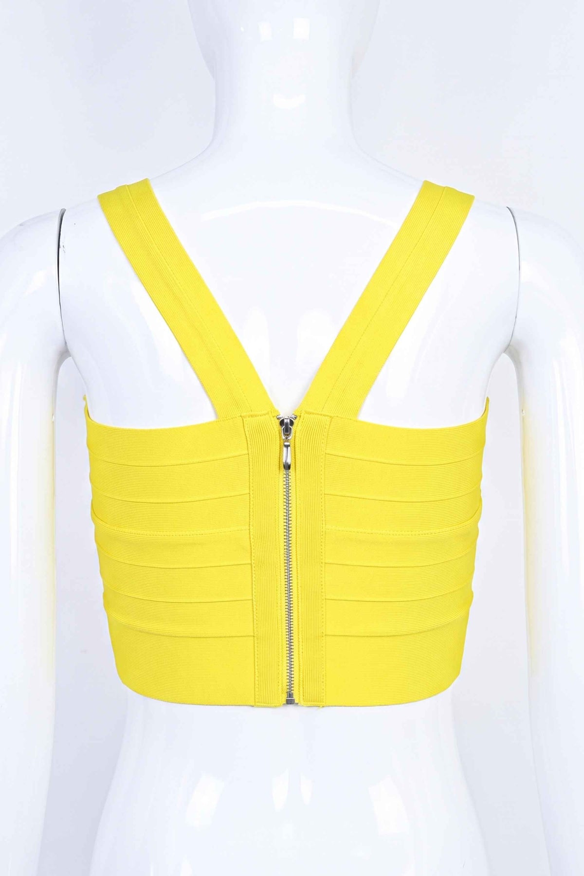 Woman wearing a figure flattering Jay Bandage Crop Top - Sun Yellow BODYCON COLLECTION