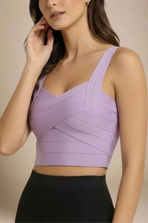 Woman wearing a figure flattering Jay Bandage Crop Top - Violet Purple BODYCON COLLECTION