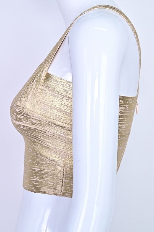 Woman wearing a figure flattering Jay Bandage Leather Crop Top - Gold BODYCON COLLECTION